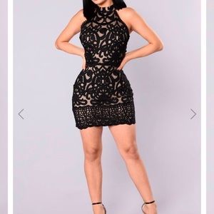 Lace overlay dress with lace up back. Never worn.
